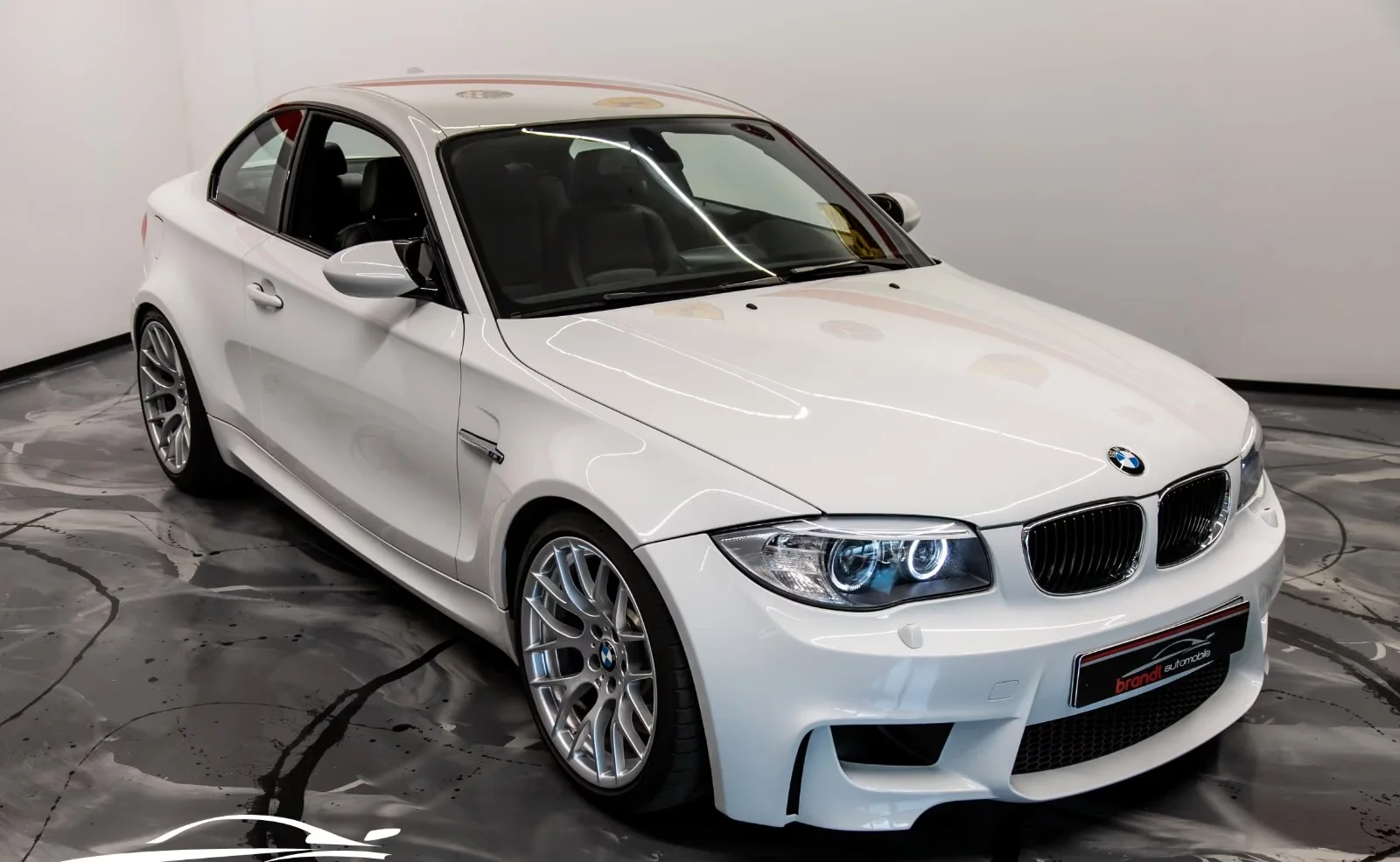 BMW 1M Coupé 3.0 biturbo 340 ch • Boîte manuelle 6 • KW V3 • Cuir • Harman Kardon