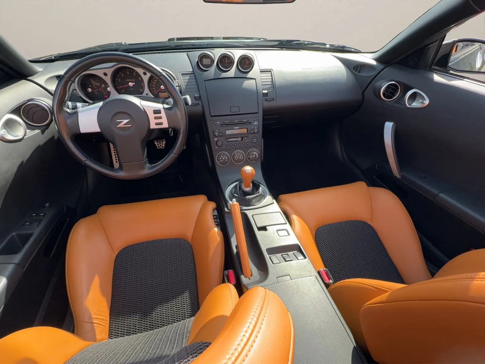 NISSAN 350Z ROADSTER 3.5 V6 280ch PACK PREMIUM - CUIR ALCANTARA ORANGE - BOSE - SIÈGES CHAUFFANTS - FREINS BREMBO