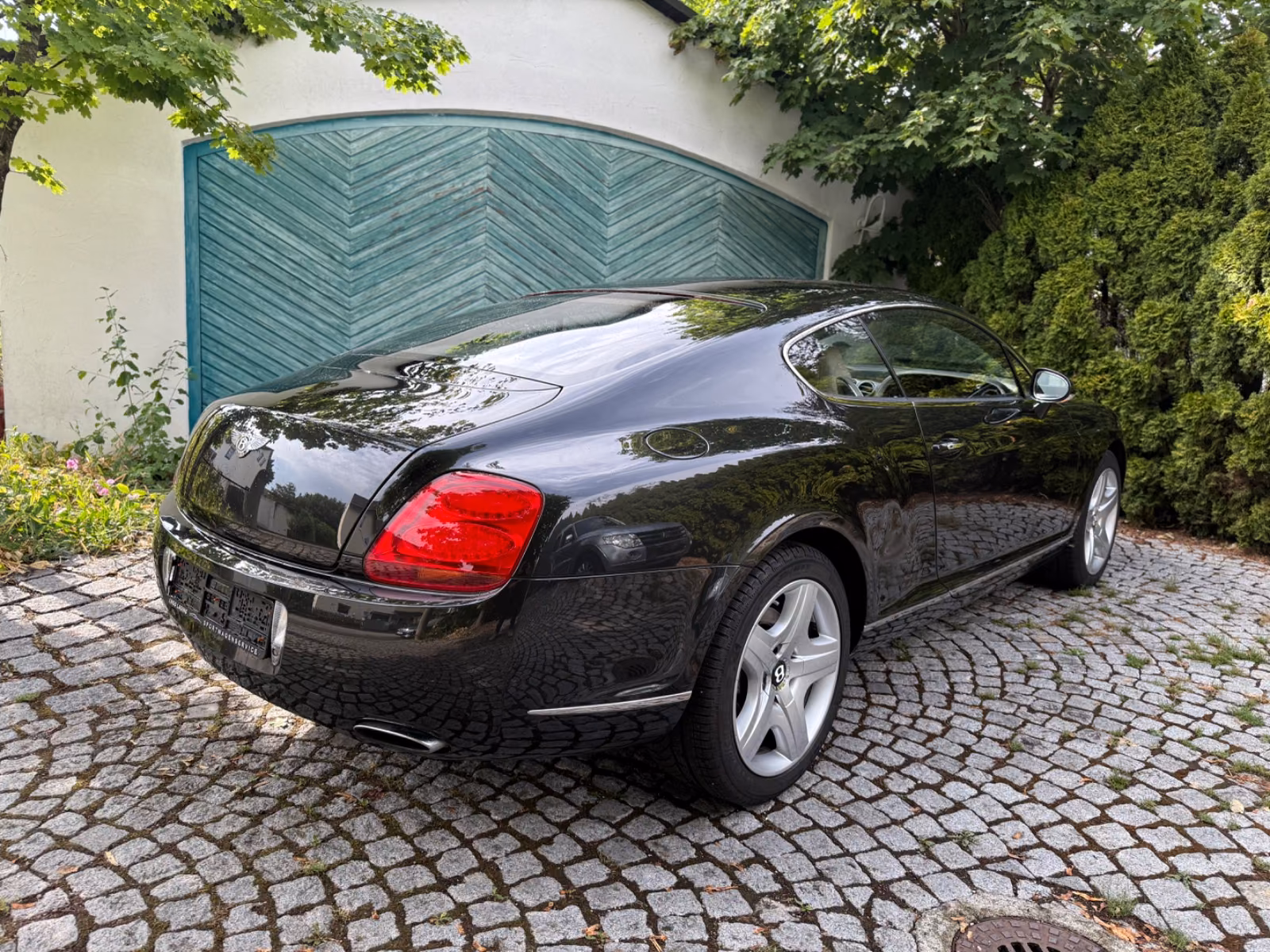 Bentley Continental GT W12 6.0 560 ch • Boîte auto • 4x4 • Cuir beige • GPS