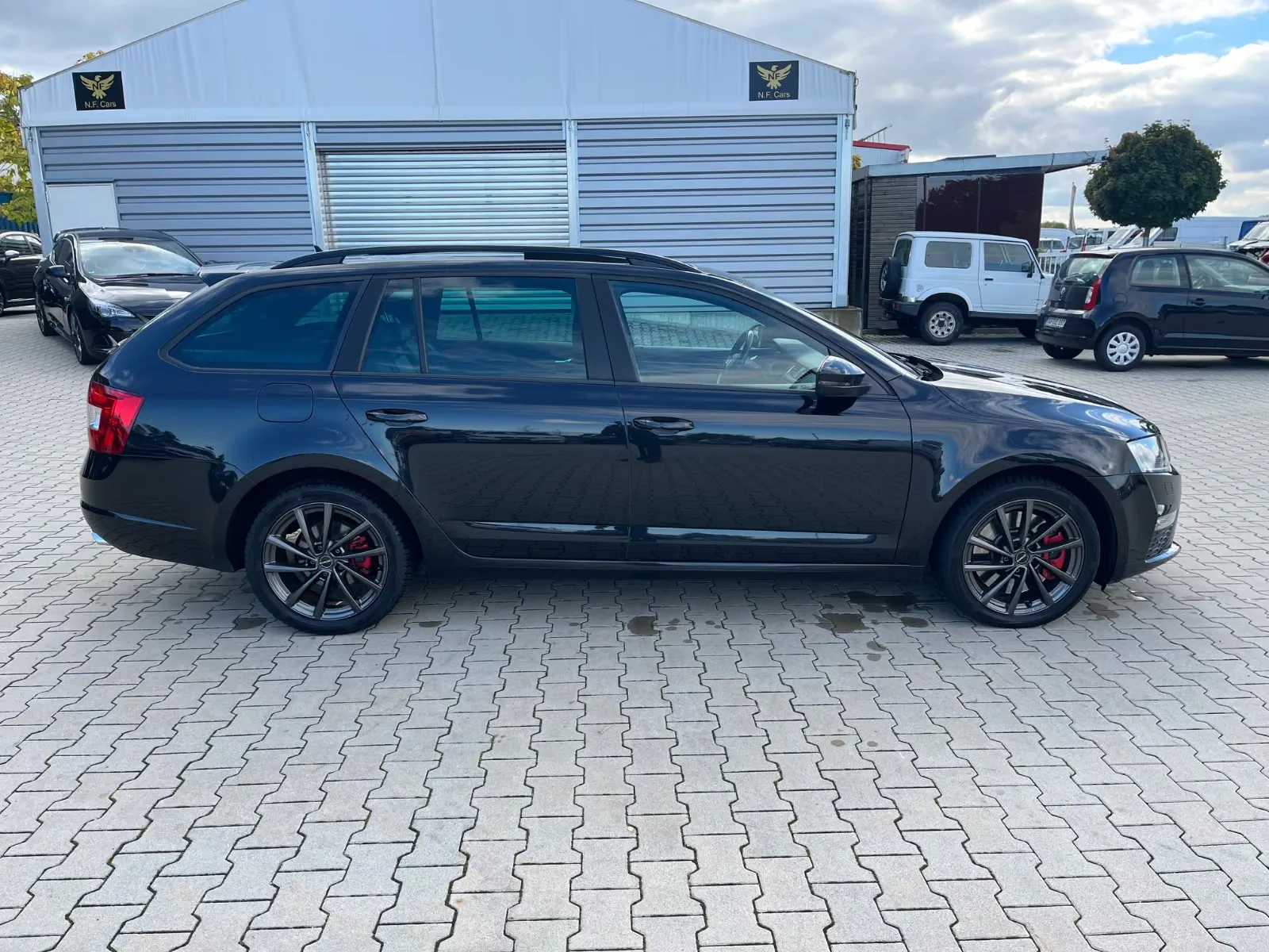 SKODA OCTAVIA COMBI RS 2.0 TDI 184ch DSG - TOIT PANORAMIQUE - ATTELAGE AMOVIBLE - GPS COLUMBUS - JANTES 19" - SIÈGES CHAUFFANTS