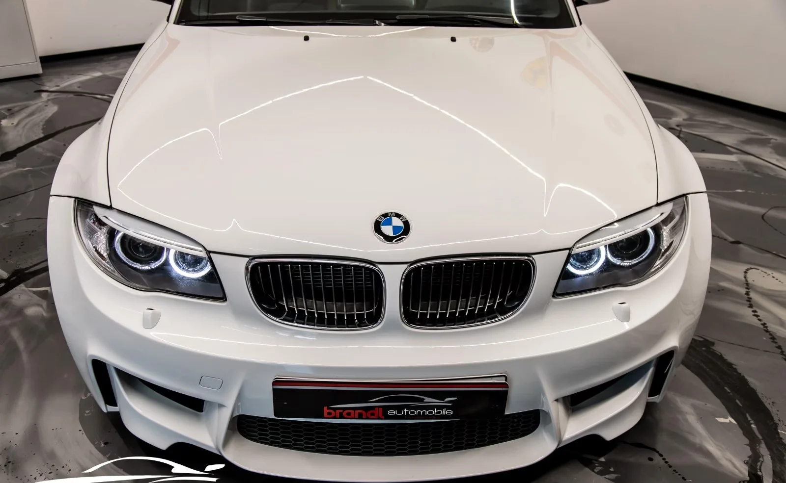 BMW 1M Coupé 3.0 biturbo 340 ch • Boîte manuelle 6 • KW V3 • Cuir • Harman Kardon