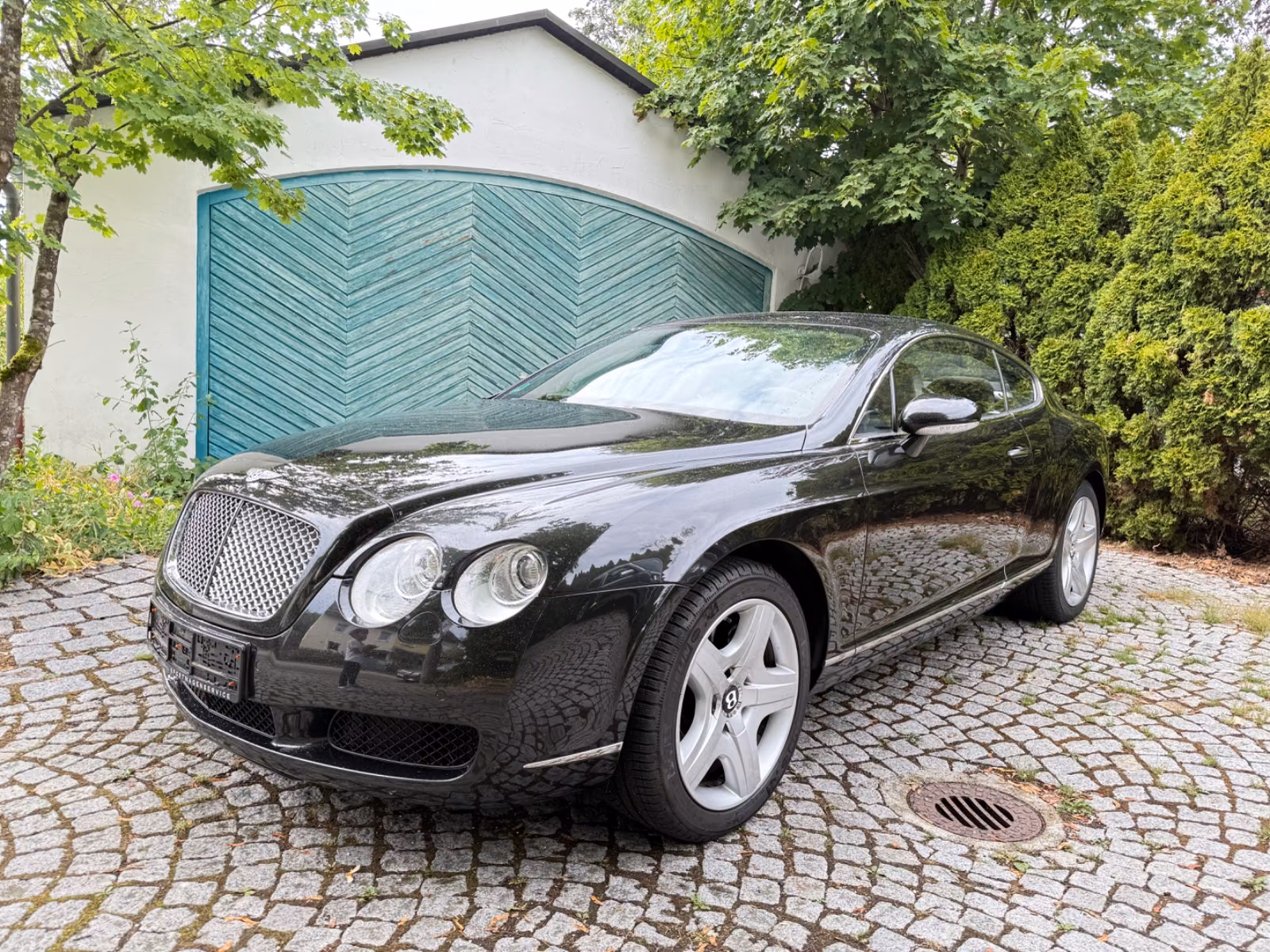Bentley Continental GT W12 6.0 560 ch • Boîte auto • 4x4 • Cuir beige • GPS