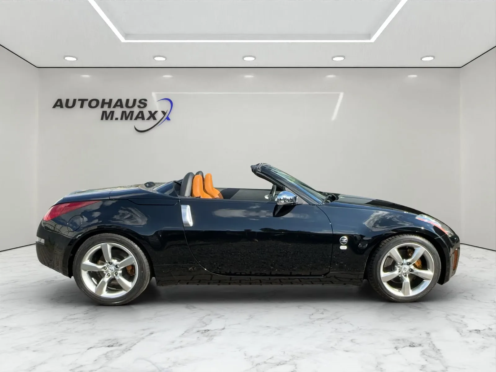 NISSAN 350Z ROADSTER 3.5 V6 280ch PACK PREMIUM - CUIR ALCANTARA ORANGE - BOSE - SIÈGES CHAUFFANTS - FREINS BREMBO