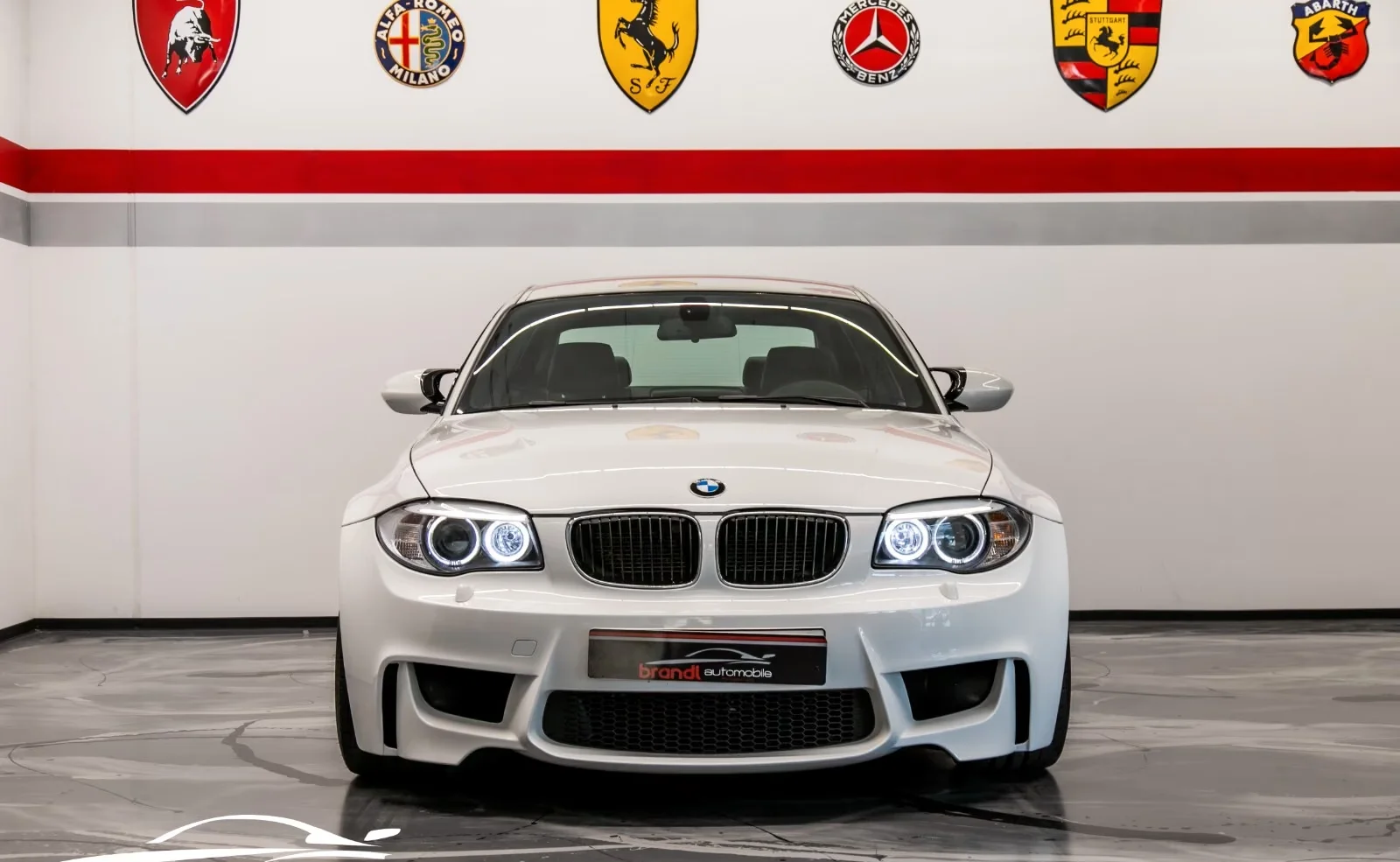 BMW 1M Coupé 3.0 biturbo 340 ch • Boîte manuelle 6 • KW V3 • Cuir • Harman Kardon