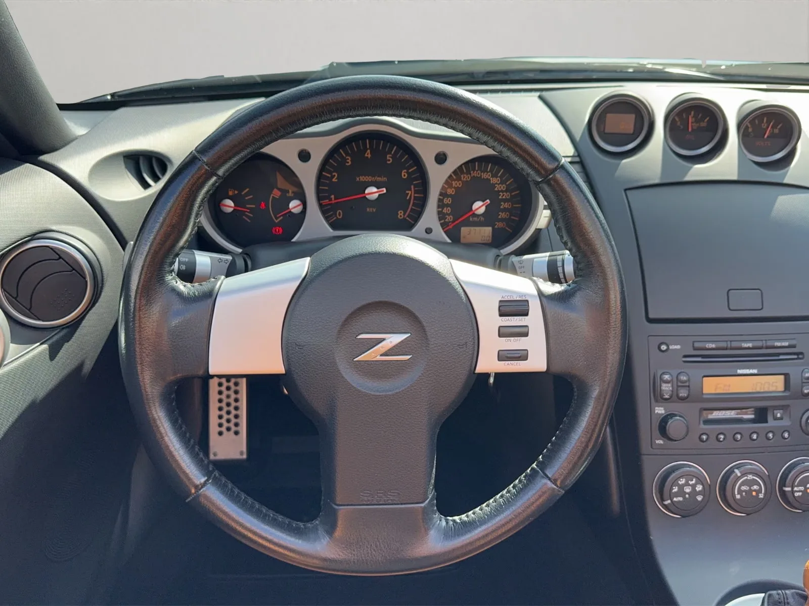 NISSAN 350Z ROADSTER 3.5 V6 280ch PACK PREMIUM - CUIR ALCANTARA ORANGE - BOSE - SIÈGES CHAUFFANTS - FREINS BREMBO