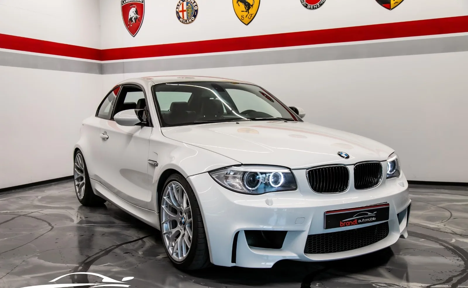 BMW 1M Coupé 3.0 biturbo 340 ch • Boîte manuelle 6 • KW V3 • Cuir • Harman Kardon
